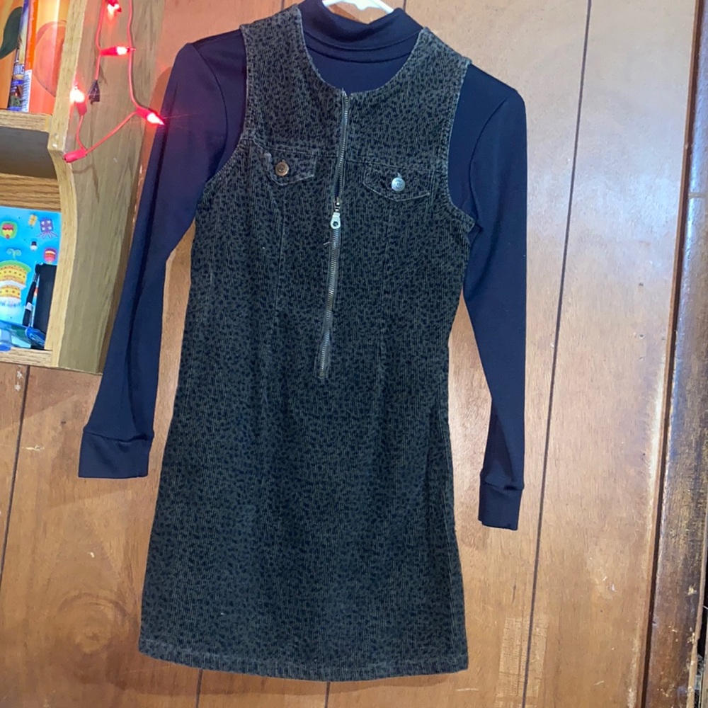 Black and brown cheetah print dress long black under sleeve.